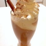 Spiked Apple Cider Float with cinnamon