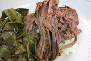 Slow cooker beef brisket and collard greens